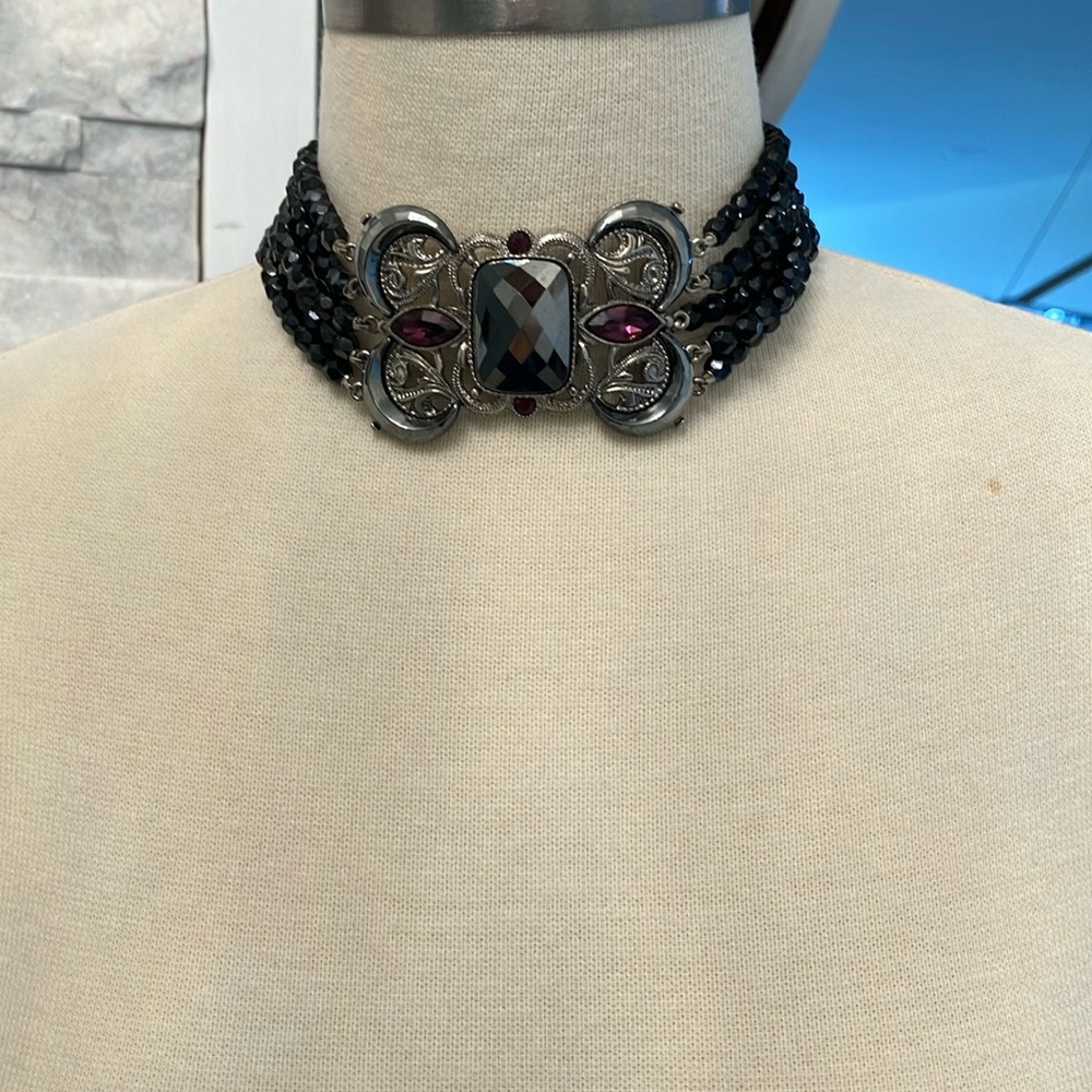 1928 Brand Choker Necklace.  Charcoal Center Stone with Purple Side Stones.